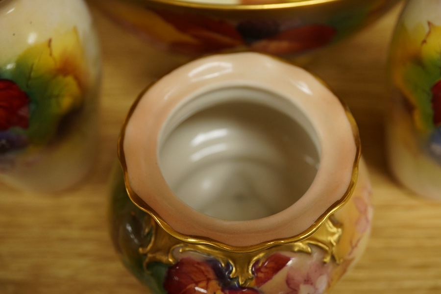 Four pieces of Royal Worcester porcelain hand painted with fruit and flowers by Kitty Blake, largest 18cm wide. Condition - good, bowl with hairline crack